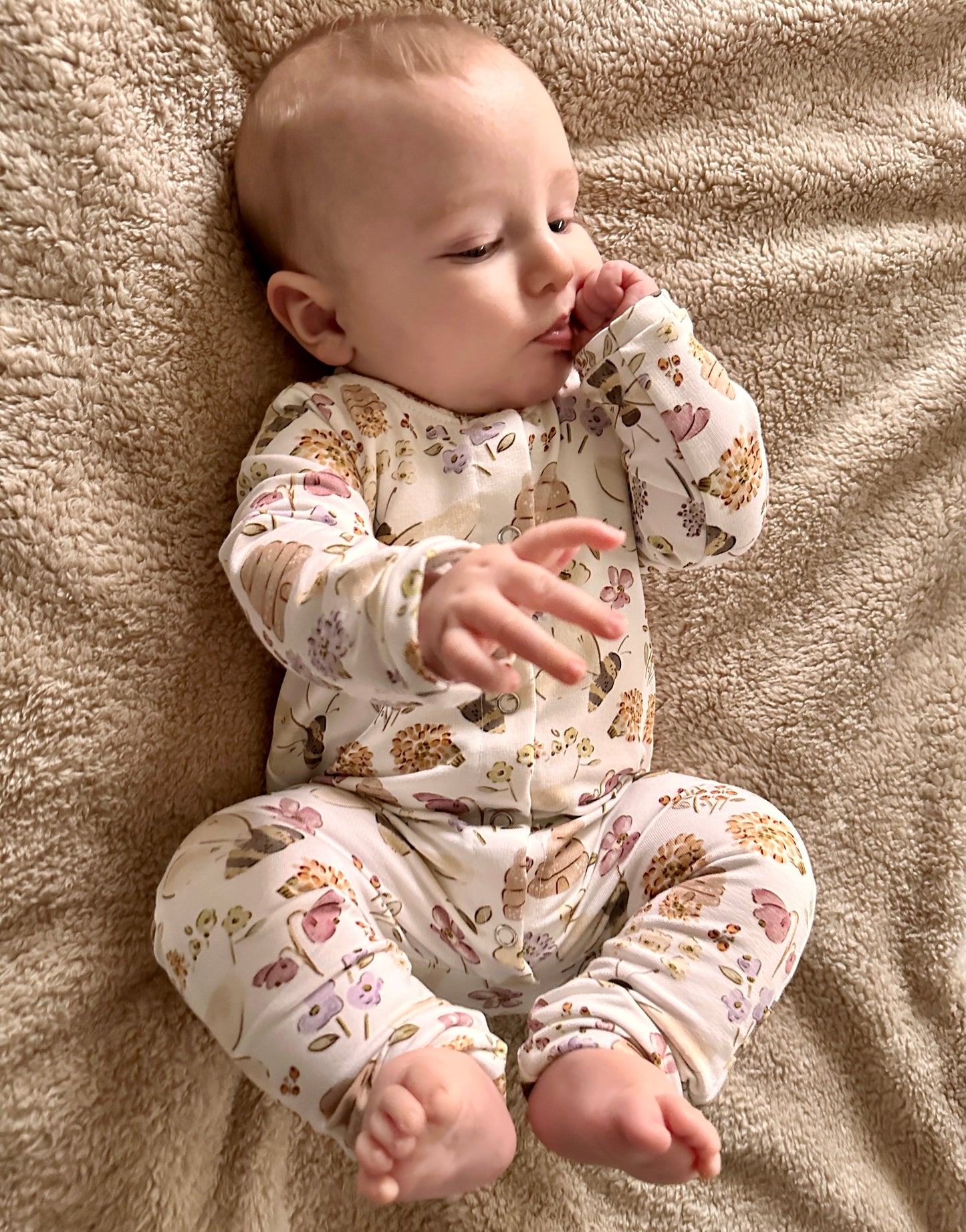 Front opening romper with bees and flowers