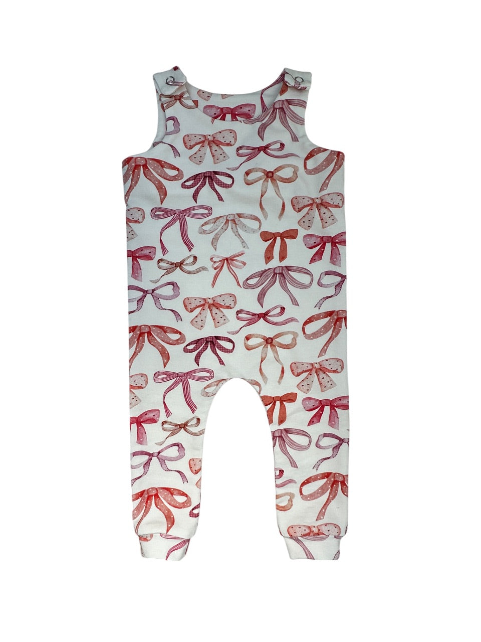 Child's romper featuring a charming bow design