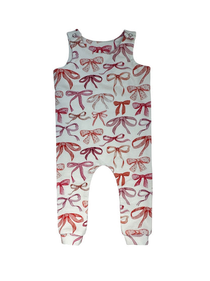 Child's romper featuring a charming bow design