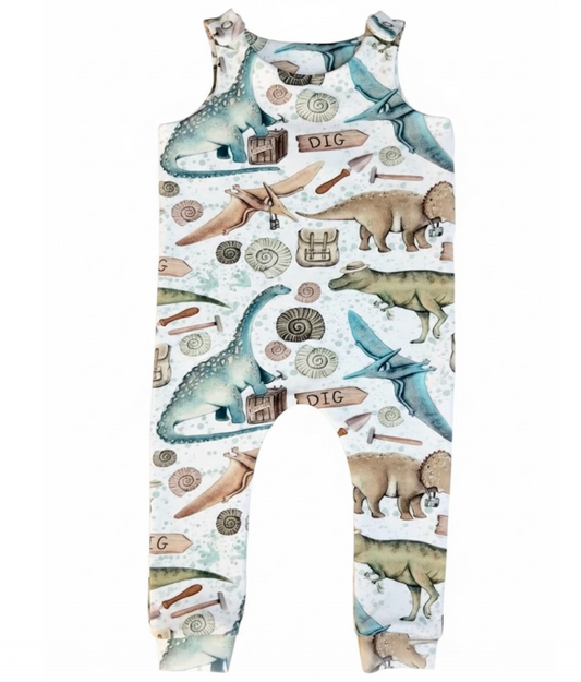 Children's romper with dinosaur themed design on a white background