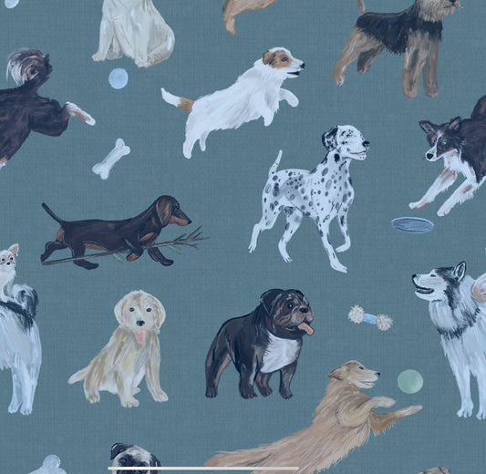 Pattern of various dogs on a blue background