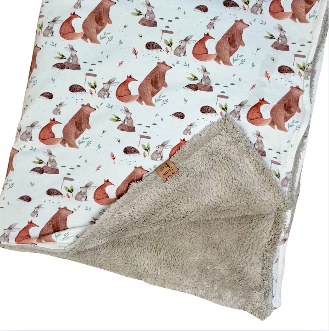 Baby blanket with forest animal pattern and textured back