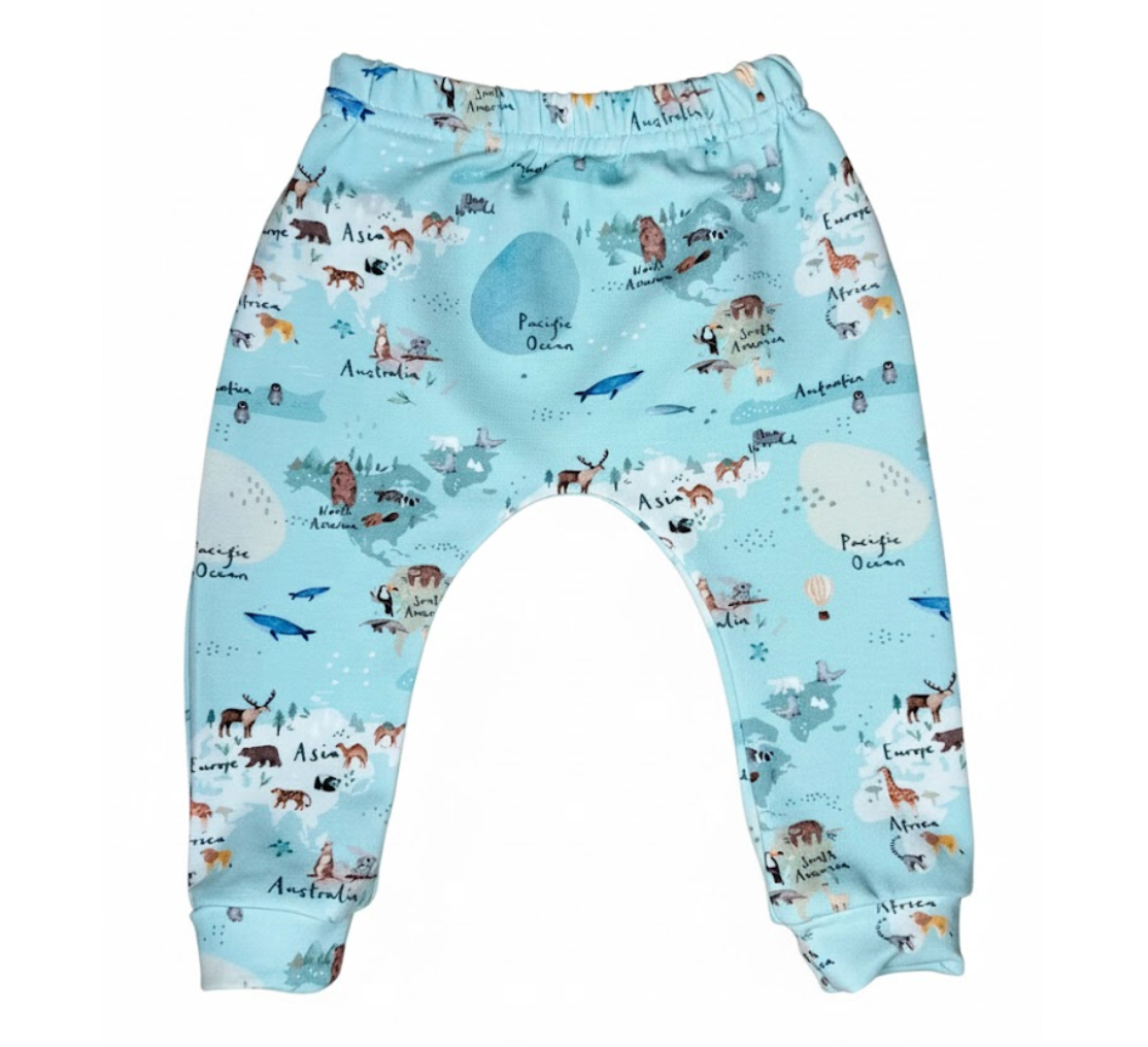 Baby leggings with a world map and animal pattern on a light blue background