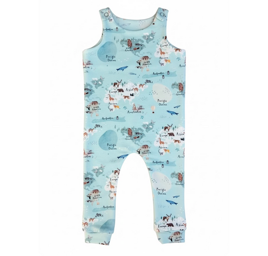 Children's romper with animal pattern on a light blue background