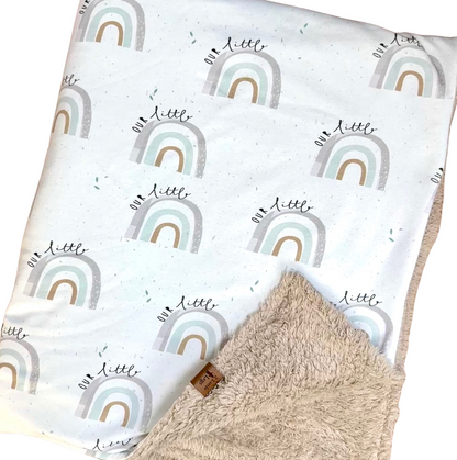 Fleece baby blanket featuring rainbows