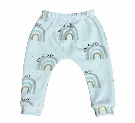 Baby leggings with rainbow pattern on a white background