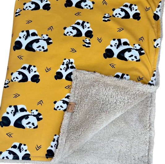 Fleece baby blanket featuring a panda pattern