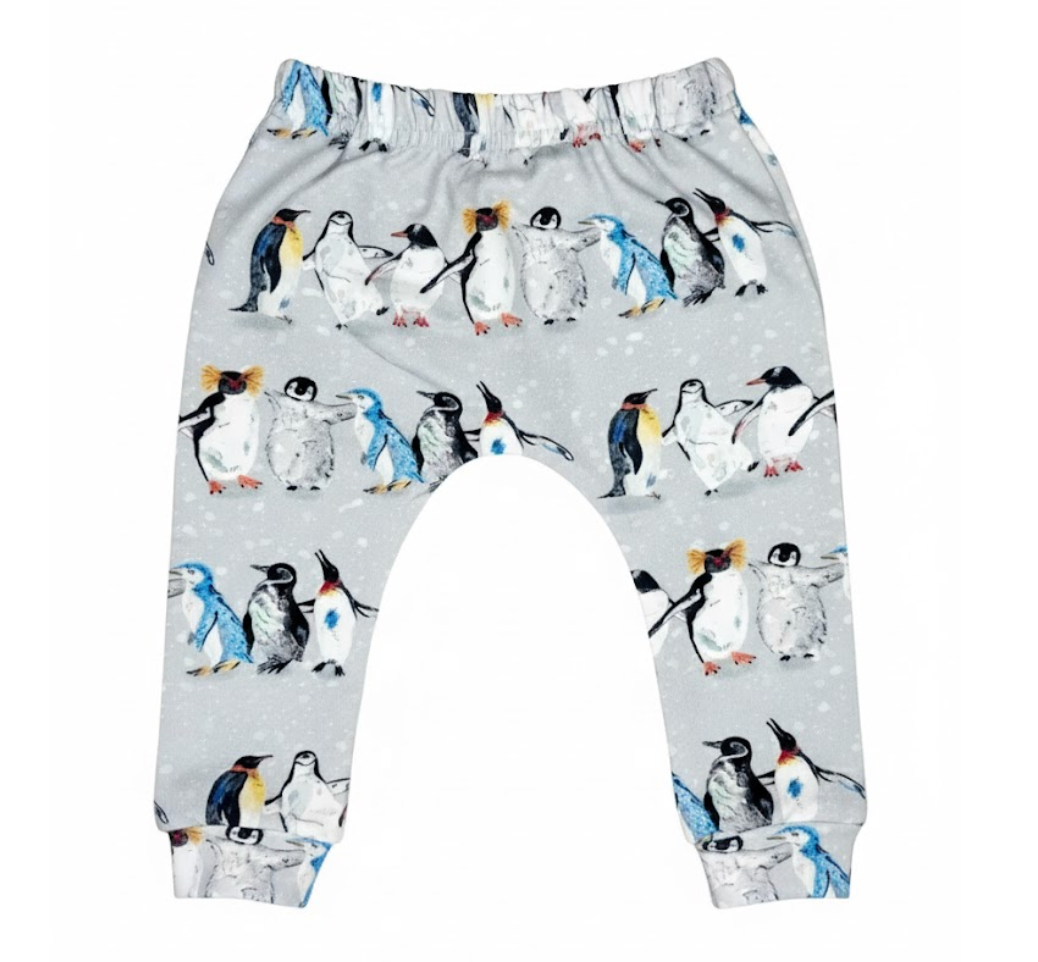 Children's leggings with a penguin pattern on a grey background