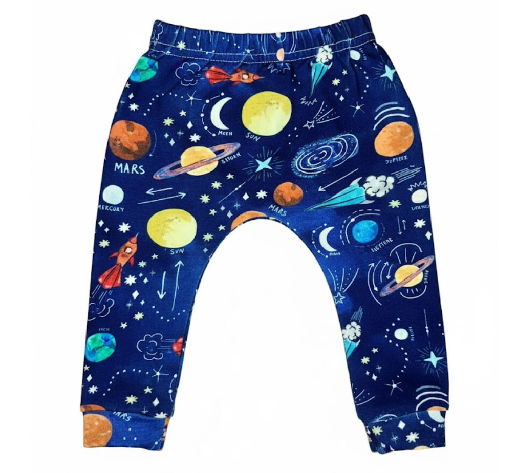 Children's leggings with space-themed design on a white background
