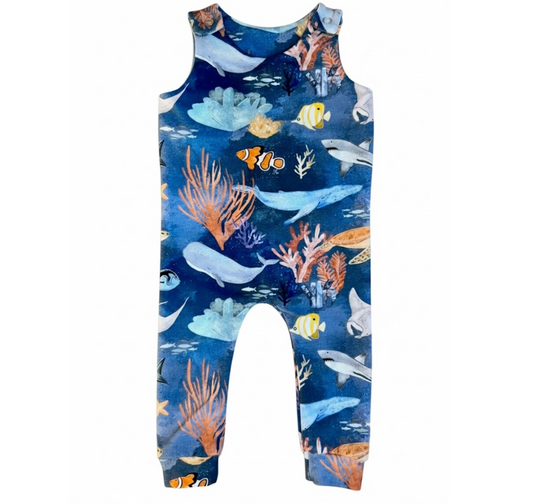 Children's romper with ocean-themed design on a white background