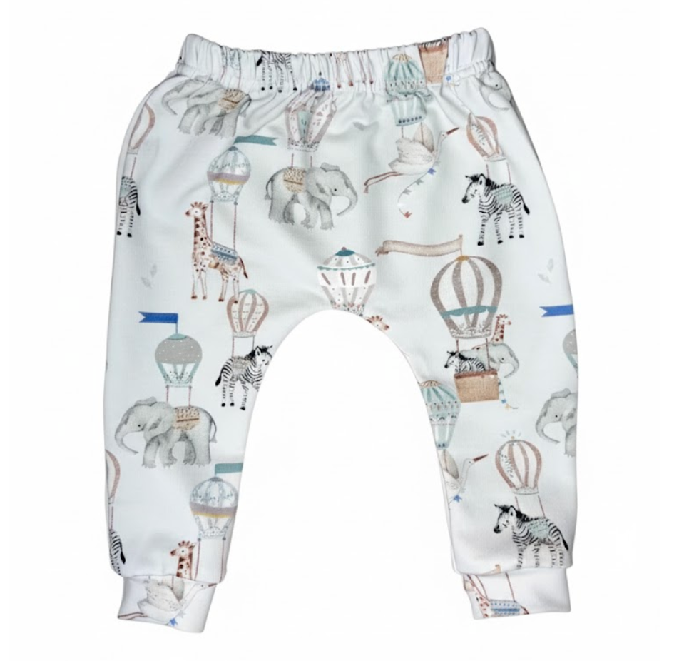 Children's leggings with animal and hot air balloon pattern on a white background